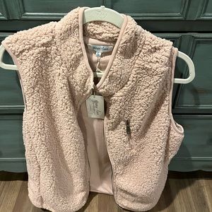 Blush colored Sherpa vest.